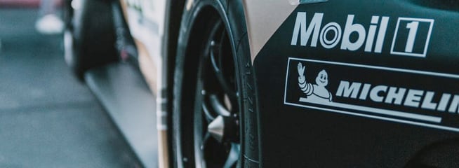 A racing car seen from behind.